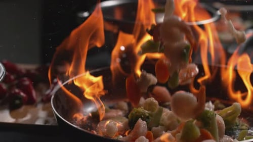Shrimp and Vegetable Stir Fry Cooking on Fire