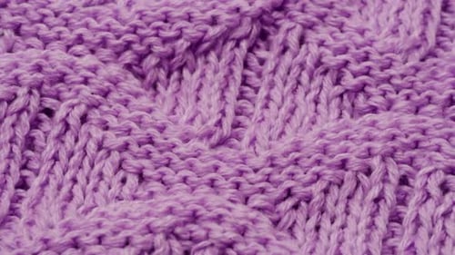 Knitted Purple Woman Warm Grey Sweater or Scarf Textile Macro of Wool Fabric Texture Close Up