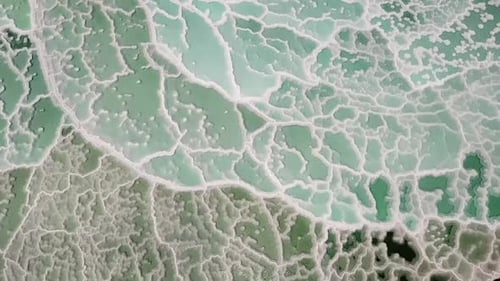 Aerial Shot Of Salt Formations At Dead Sea, Drone Flying Forward Over Lake