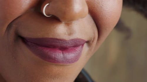 Closeup of a smiling woman with perfect white teeth