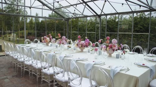 Elegant Wedding Table Setting in Glass Greenhouse