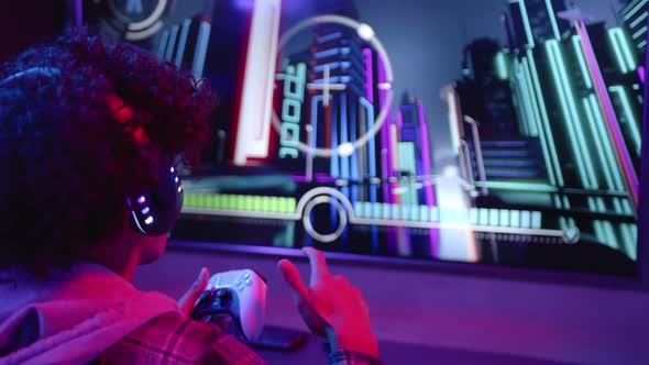 Playing video game, man using controller and pointing at futuristic ...
