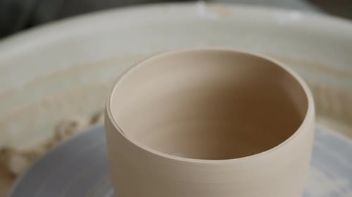 Forming Pottery Bowl on a Wheel Close Up