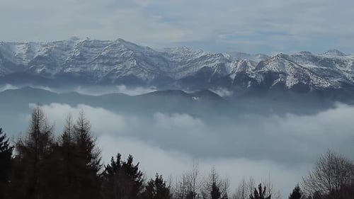 Landscape of mountains and clouds softly moving; Mountains over the clouds