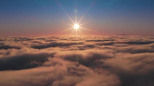 Aerial View of Sun Over Cloudscape