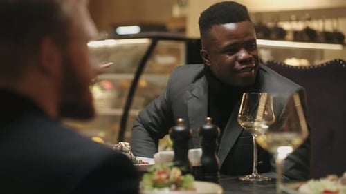 Multi Ethnic Men Friends Meeting in Restaurant in Evening Dining Together Portrait of Black Guy