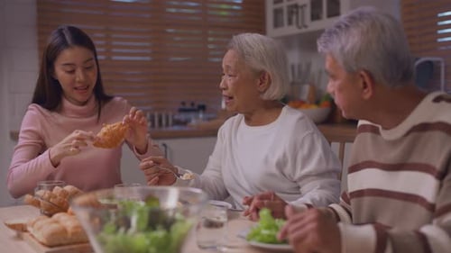 Family Meal in Bright Kitchen with Salad and Bread