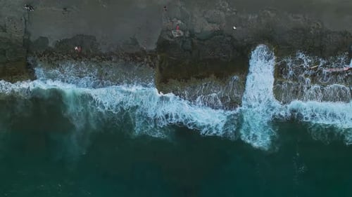 Aerial View Coastal Calmness at Dusk Relaxing By Textured Seas