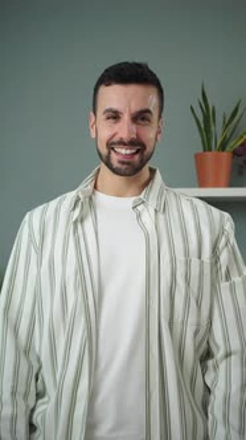 Smiling Young Adult Man Portrait in Home Setting