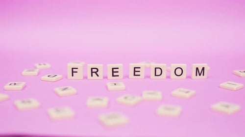 Letter Tiles Spell Out the Word Freedom