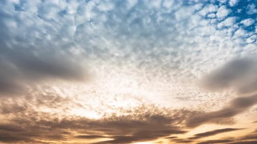 Cloud Formations in Time Lapse Effects. Cotton Cloud Cluster on Blue Sky Background. Beautiful Cloud