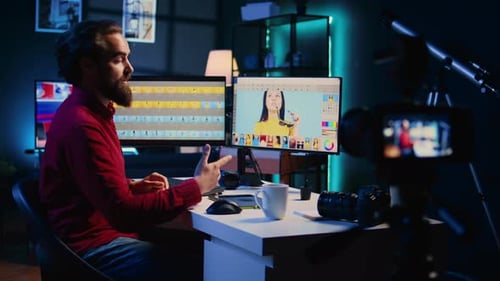 Man Editing Photo at Desk in Modern Office
