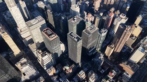 Aerial video above skyscrapers and skyline in Manhattan, New York