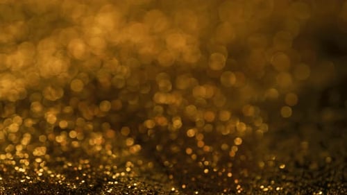 Abstract golden glitter landscape, bokeh light painting. 100mm Slow Motion 4K