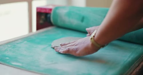 Clay, hands and pottery with person in workshop closeup for art, crafts or creative hobby