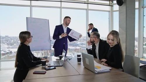 Dynamic Business Meeting in Modern Urban Office