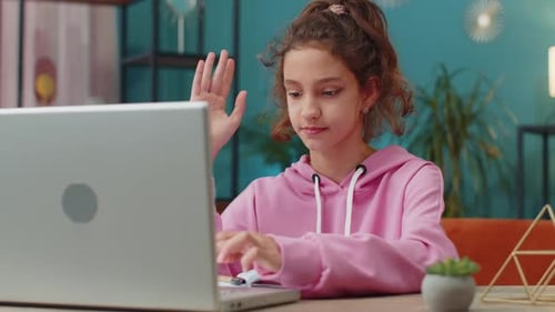 Preteen School Girl Using Laptop for Online Lesson Doing Homework Distance Learning Education