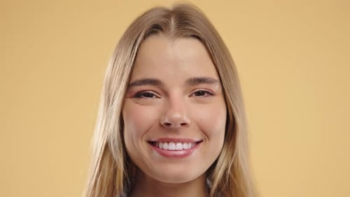 Smiling Woman Close Up Studio Shot