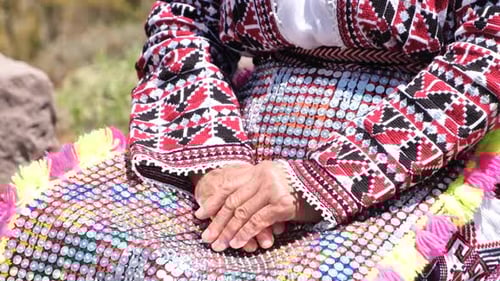 Woman Wearing Traditional Colorful Garment in Daylight