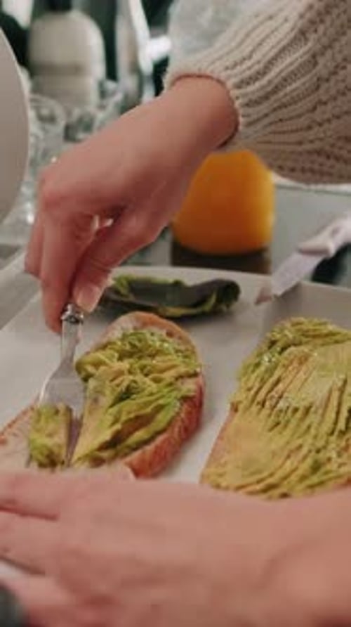 Preparing Healthy Avocado Toast for Breakfast at Home