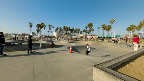 Skateboarder skateboarding in Venice Beach skate park Los Angeles