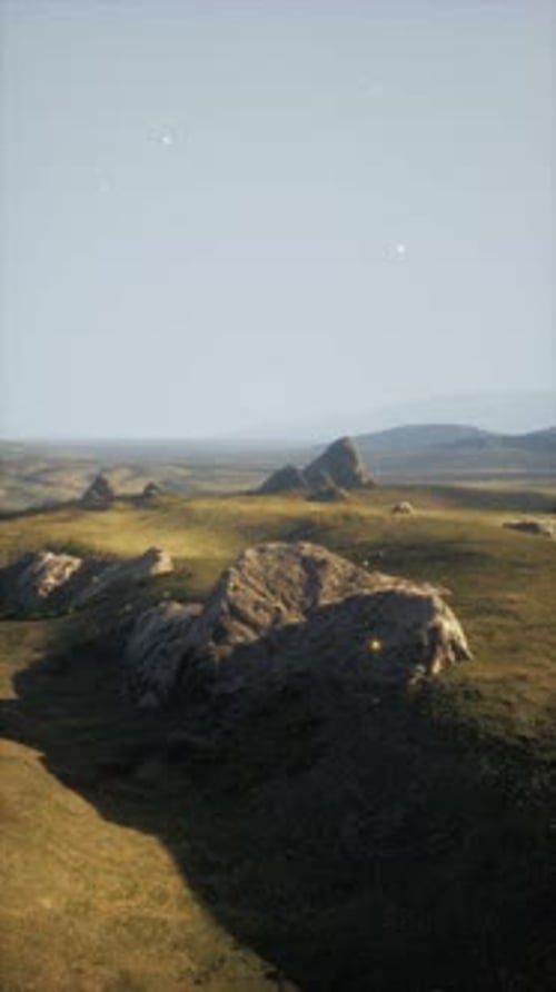 Field With Rocks and Distant Grass