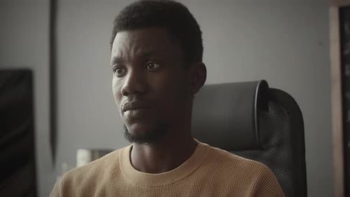 IT Specialist Using Computer during Office Workday