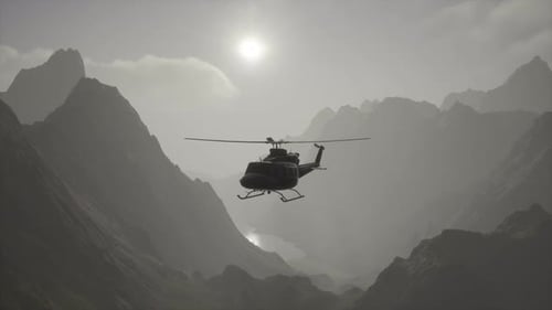 A Helicopter is Flying Over a Mountain Range