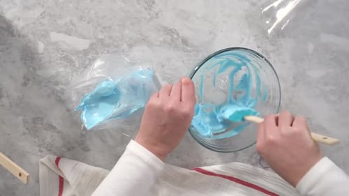 Flat Lay Step By Step Transfering Meringue Mix Into Piping Bags with Metal Tips to Bake Unicorn