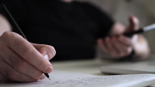 Creative Journaling: Man Working from Home Office