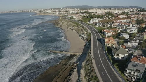 Ocean Meets City: Coastal Road Aerial View