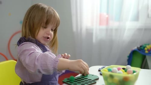 Nurturing Minds Child Explores Educational Games with Teacher Preschool Setting