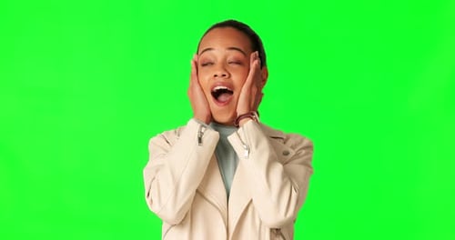 Green screen, wow and hands on face of woman in studio with news, announcement