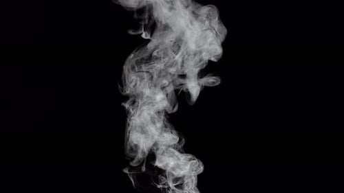 Smoke Spraying Up On Black Background