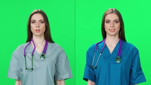 Portrait of Woman Nurse Pretty Woman Doctor Looks at the Camera and Smiles an Young Intern on a