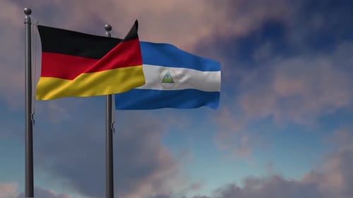 Waving Flags of Germany and Nicaragua Against Sky