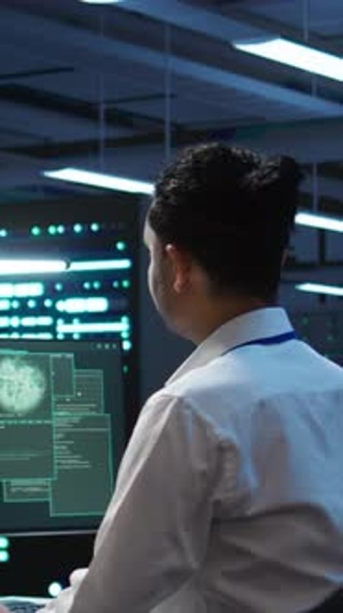 Vertical Video Engineer in Server Hub Frightened By Hacker Passing Company Firewall