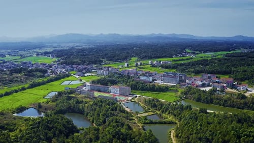 Aerial View of Town in Lush Countryside