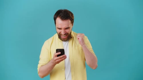 Male User Recommends Mobile App Pointing to Phone Screen