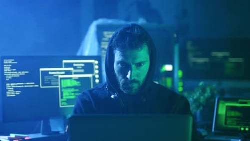 A Cybersecurity Expert Diligently Working on Complex Code in a Dimly Lit Environment