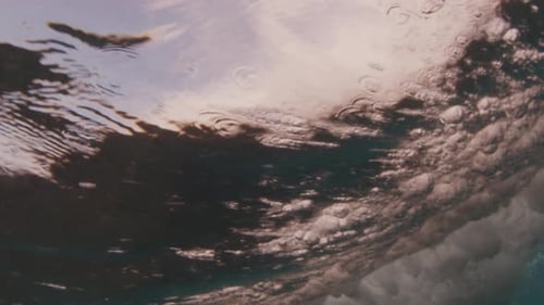 Underwater view of the breaking wave in the Maldives