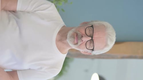 Senior Man Looking Directly at Camera Close Up