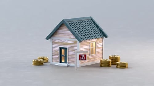 Rising real estate prices and housing market concept with growing stacks of coins around a house