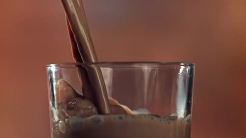 Hot Chocolate is Poured Into a Glass Filmed on a Highspeed Camera at 1000 Fps