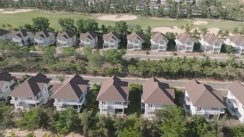 Aerial View of Upscale Suburban Homes with Golf Course