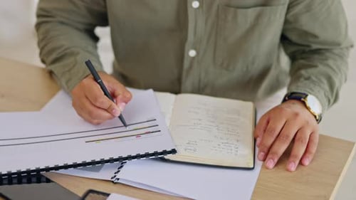 Writing, notebook and research with hands of man in office for strategy