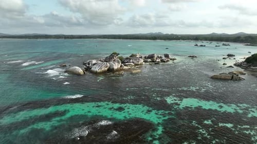 Aerial View of Unique Rock Island in Tropical Ocean