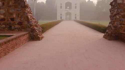 humayun tomb entrance gate at misty morning from unique perspective