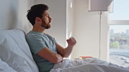 Sad Guy Sitting Bed Modern Hotel Room Feeling Unhappy Closeup Upset Man Morning