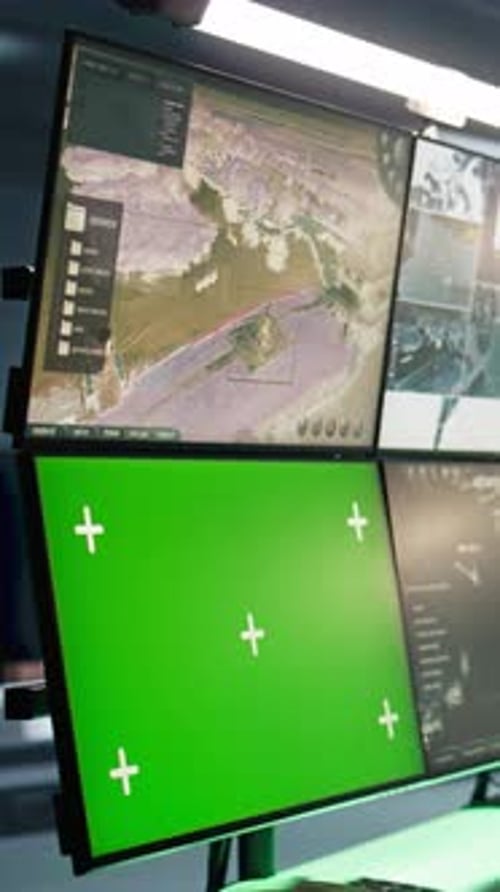 Vertical Video Military Specialist Using Radar on Chroma Key Gear to Look at Assault Zones